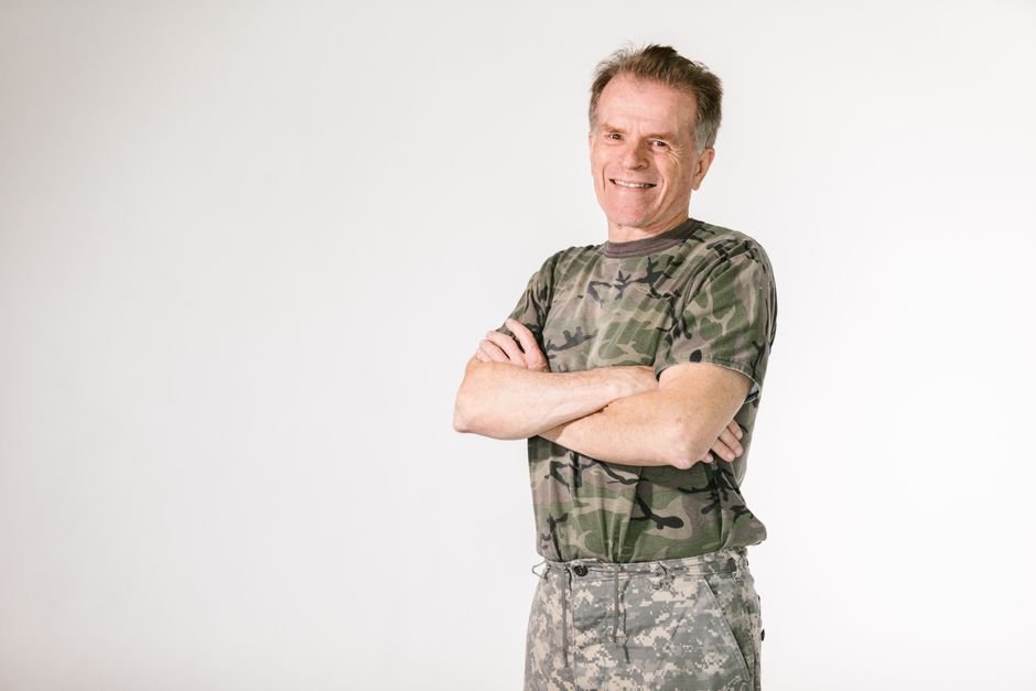 A smiling military veteran